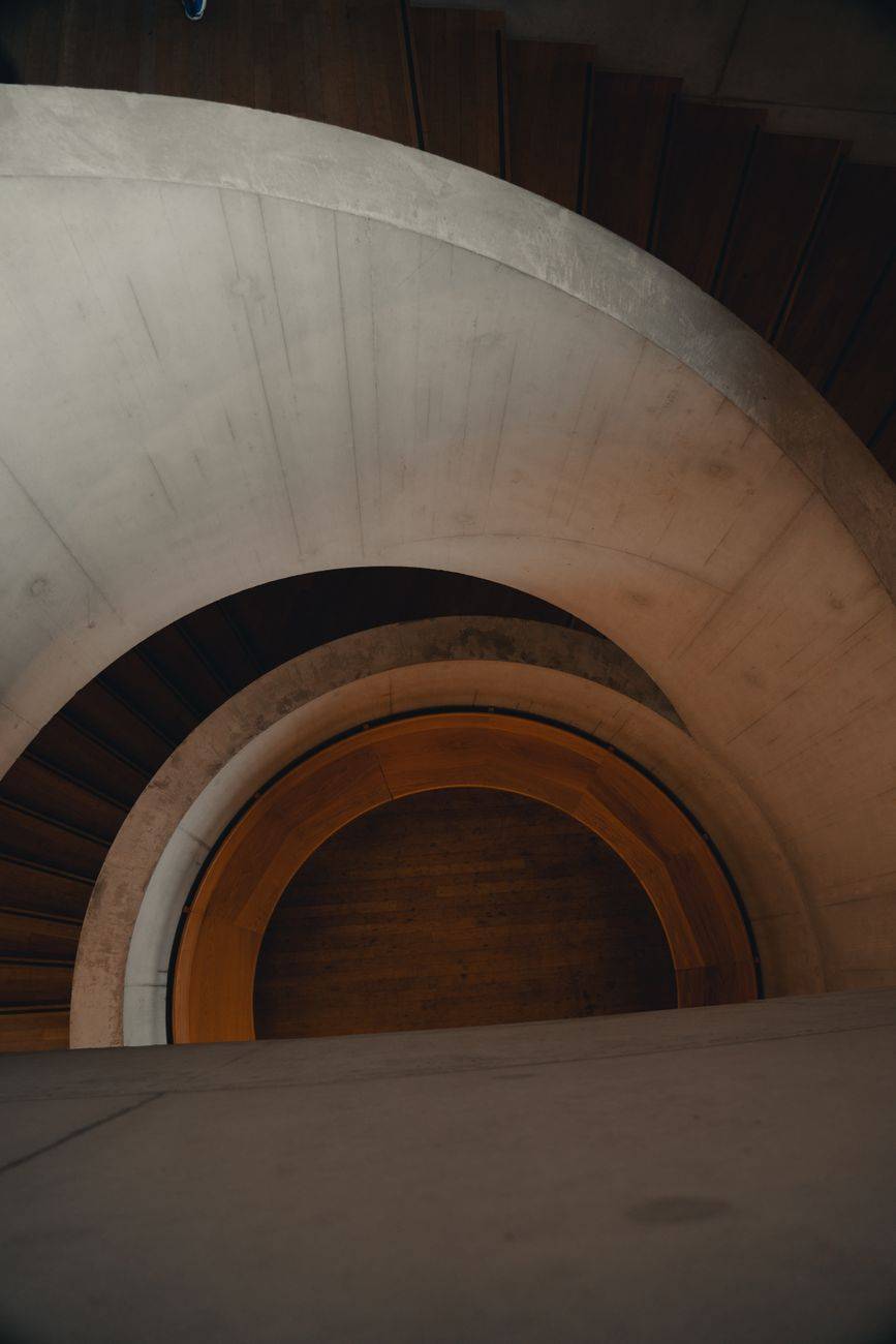 A captivating view of a modern spiral staircase showcasing architectural elegance indoors.