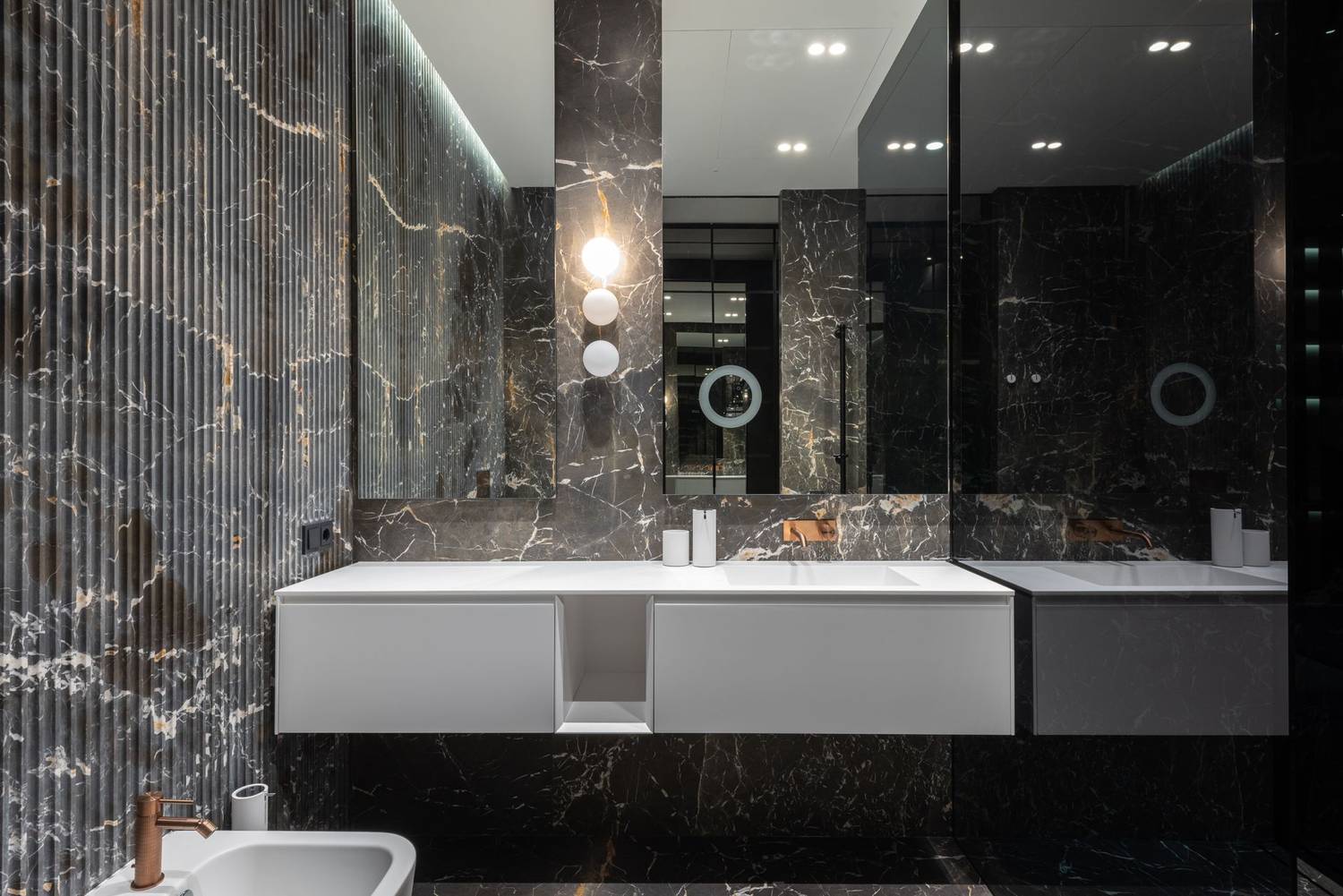 Interior design of modern stylish bathroom with big mirrors and white ceramic tub near sink
