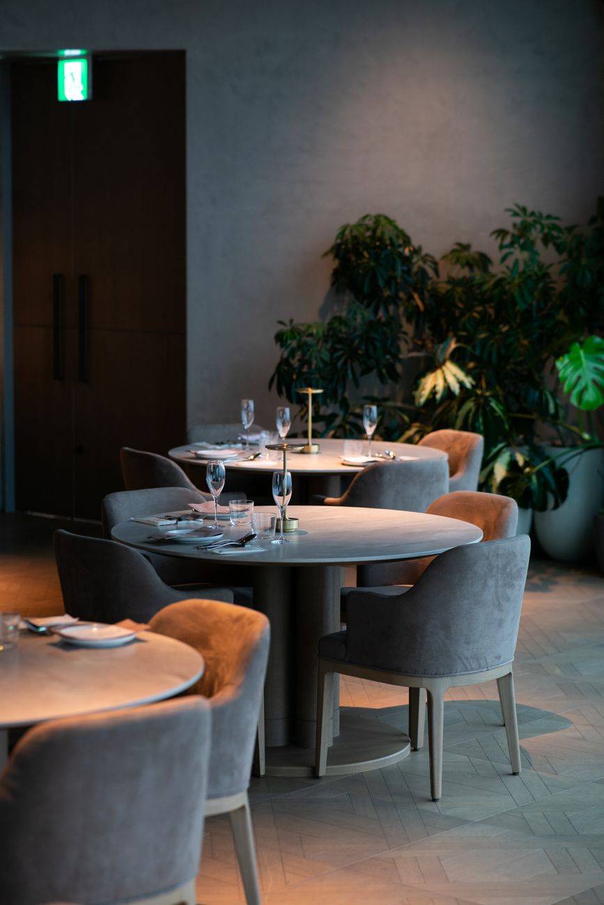 Cozy dining setup with elegant decor in a Tokyo restaurant.
