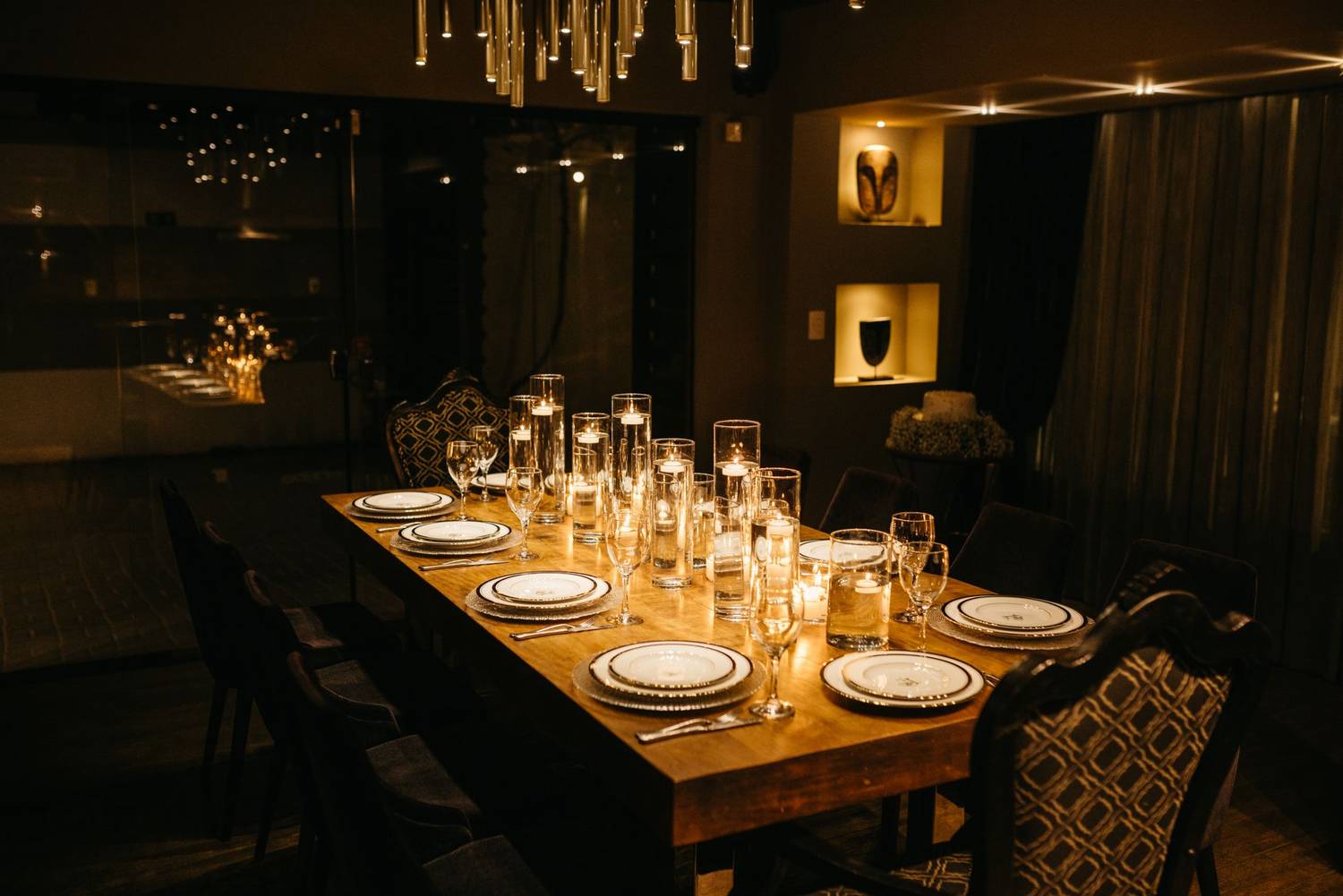 Luxurious dining room with an elegantly set candlelit table, perfect for special occasions.