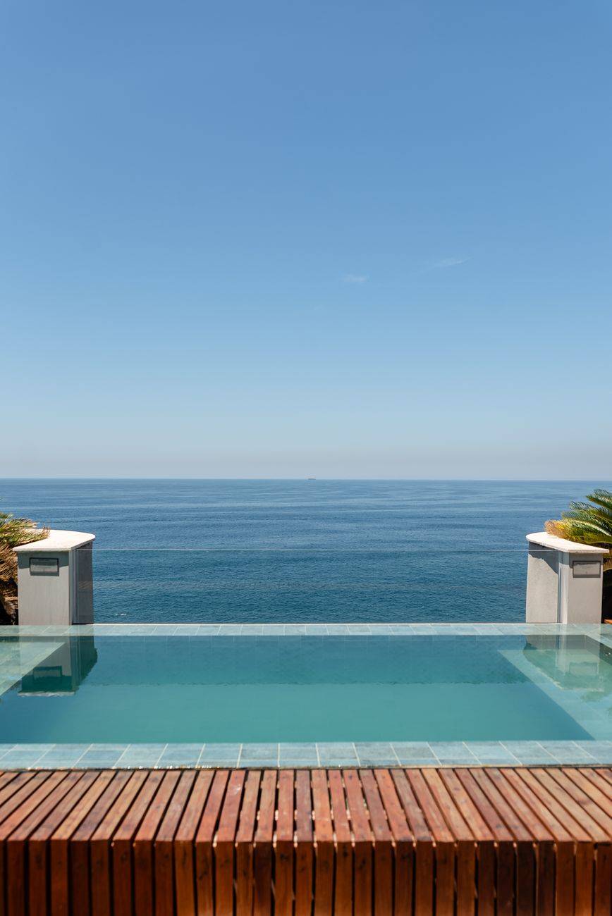 Serene ocean view from infinity pool in Rio de Janeiro, perfect for relaxation and luxury travel.