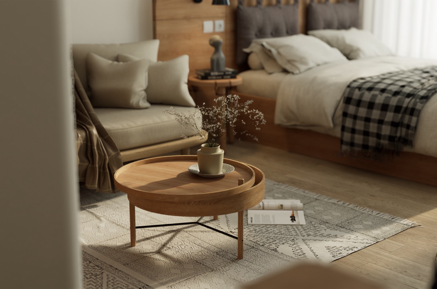 Warm Scandinavian bedroom vignette with pale wood furniture, linen bedding, a checked throw and a low round coffee table
